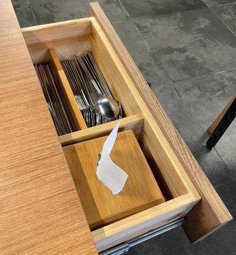 Spoon and chopsticks stored in a Korean restaurant table drawer